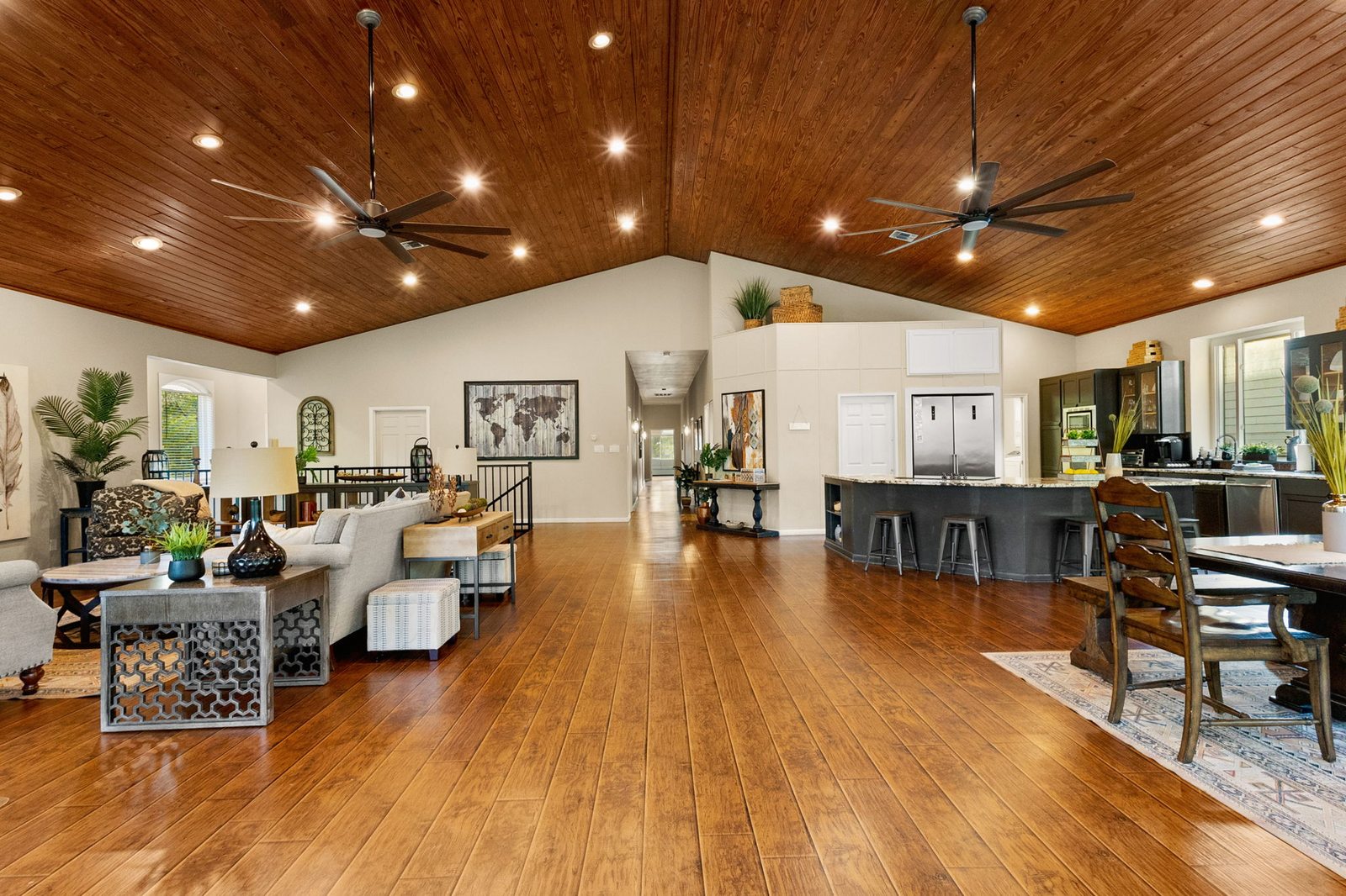 Open living area with lake views through wall to wall windows