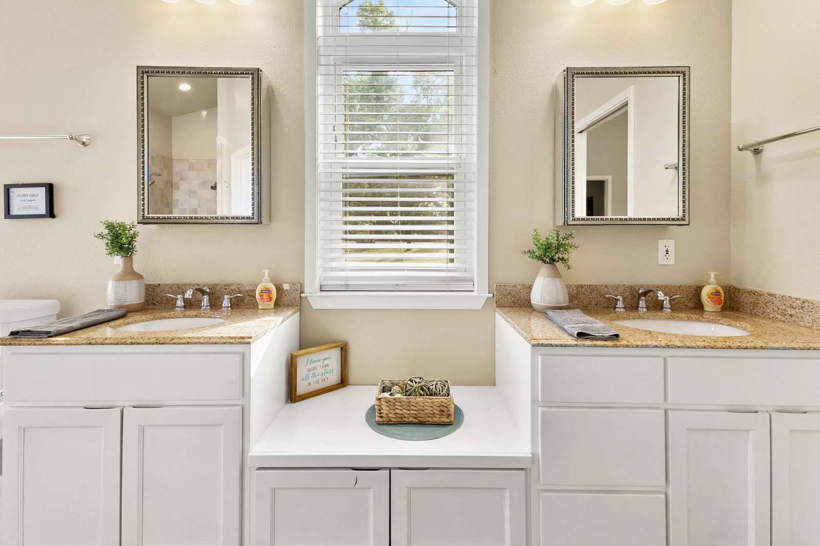 Full bathroom with double vanity