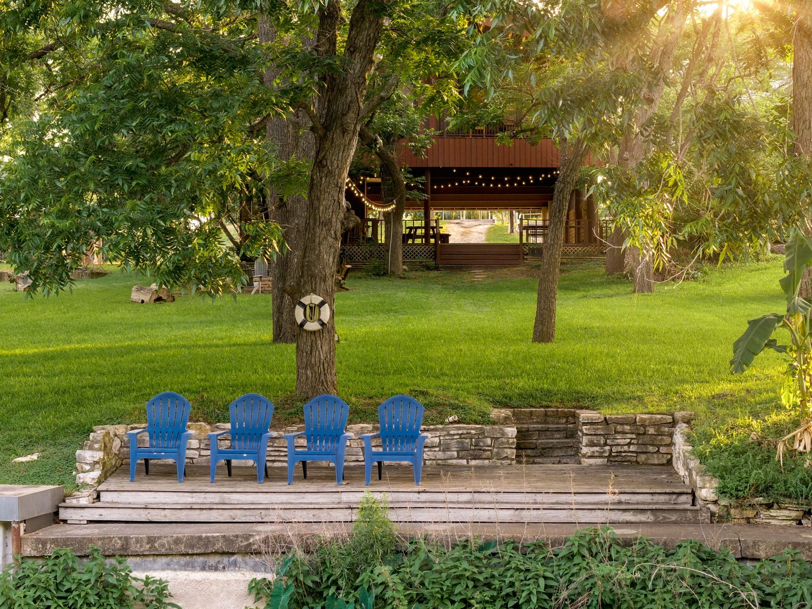 Private dock beside the tree-shaded shoreline